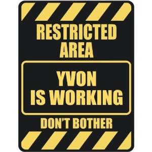   RESTRICTED AREA YVON IS WORKING  PARKING SIGN