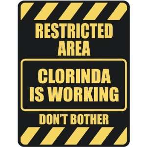   RESTRICTED AREA CLORINDA IS WORKING  PARKING SIGN