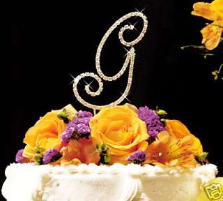This striking Gold crystal initial monogram wedding cake topper 