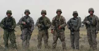 Photo above Soldiers wearing Multicam while demonstrating Future 