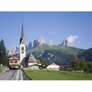 Church in the Village of Alba with the Peaks of the Sassolungo in the 