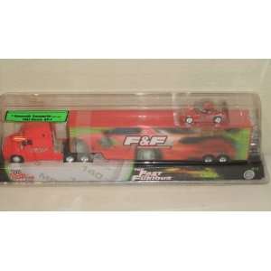   RED KENWORTH TRANSPORTER WITH AVAC 1993 RED MAZDA RX 7 Toys & Games