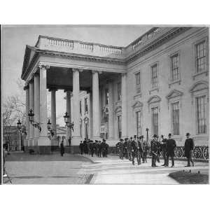   North portico of the White House,group of men in front