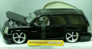 this auction is for black 2002 cadillac escalade diecast model car 