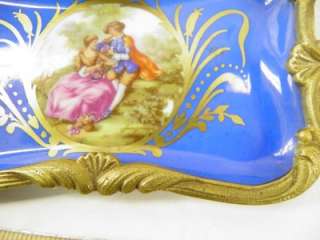We are please to be offering this elegant Sevres French porcelain hand 