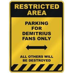 RESTRICTED AREA  PARKING FOR DEMITRIUS FANS ONLY  PARKING SIGN NAME
