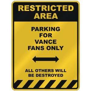  RESTRICTED AREA  PARKING FOR VANCE FANS ONLY  PARKING 