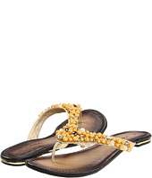 gold flip flops” 