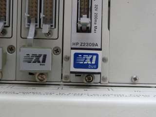HP AGILENT E1401B VXI MAINFRAME W/ Z2309A 6X E1460A E1406A RACAL 1260 