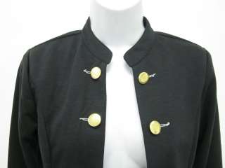 you are bidding on a new with tags the cue cher qu black button up 
