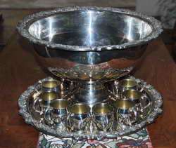 Description Punch bowl, tray and cups all in beautiful condition.