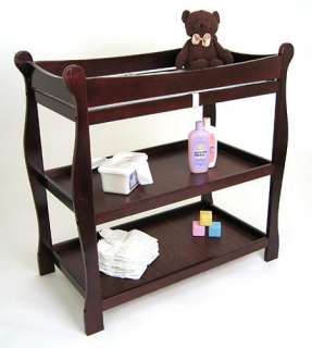 The changing table features two nicely sized shelves and ample room on 