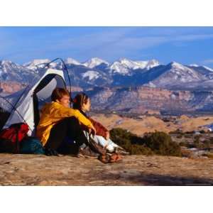  Couple Camping at Slickrock with Snow Capped Peaks in the 