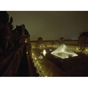  The Pyramid Glows at Night in the Cour Napoleon III at the 