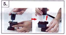   the cap of the ink container and connect the ink injection needle