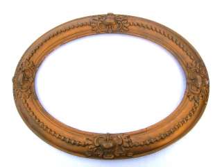 Antique Elaborate Oval Wooden Picture Frame. 25 x 19 inches outside 