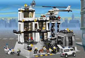 The LEGO Police Station includes a helicopter, van, and motorcycle 