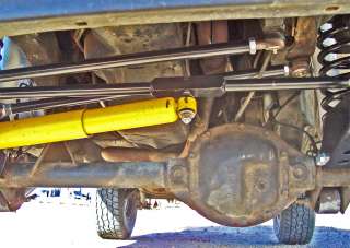 Shows steering shock mount, linkages and track bar. Paint chips and 