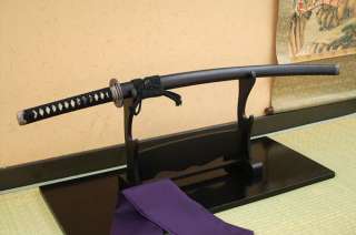   Katana collection are NOT RAZOR EDGE. The sword stand is not included