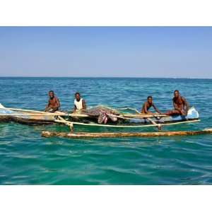 Traditional Rowing Boat in the Turquoise Water of the Indian Ocean 