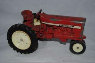 Vintage ERTL Steel farm wagons and Iternational Harvestor Tractor